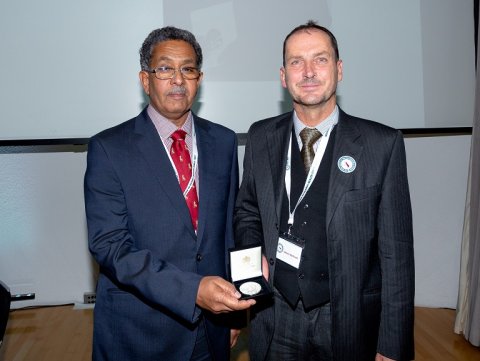 Professor Fahal receiving his award from Simon Cathcart, RSTMH Past President Professor Fahal receiving his award from Simon Cathcart, RSTMH Past President